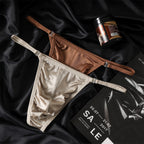 A product image of the MemoSkin Smooth Low-Rise Men's Thong in apricot color, presented from the front. The subtle, neutral tone of this comfortable men's thong makes it a versatile choice. It features lightweight, moisture-wicking nylon-spandex fabric, and a soft cotton lining for the crotch area, offering breathable comfort and a flexible fit for international customers seeking affordable low-rise men's thongs.