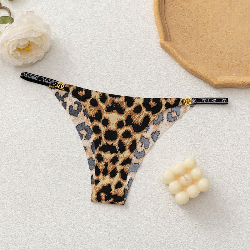 Product flat lay of MemoSkin Silky No-Show Briefs in Classic Leopard print, featuring low-rise cut, flexible stretch fabric, and breathable cotton crotch lining.