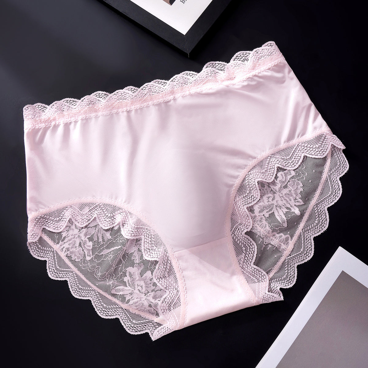 MemoSkin men's lightweight lace briefs in soft pink, combining breathable sheer floral lace, supportive 3D contoured pouch, and flexible mid-rise stretch fit for daily comfort.
