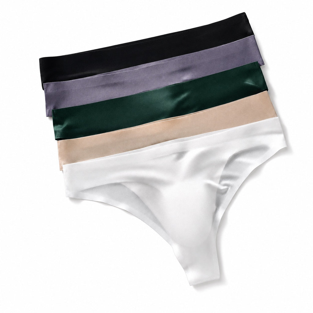 Stacked MemoSkin smooth low-rise men's thong underwear in black, gray, dark green, apricot, and white featuring flexible waistbands and breathable fabric.